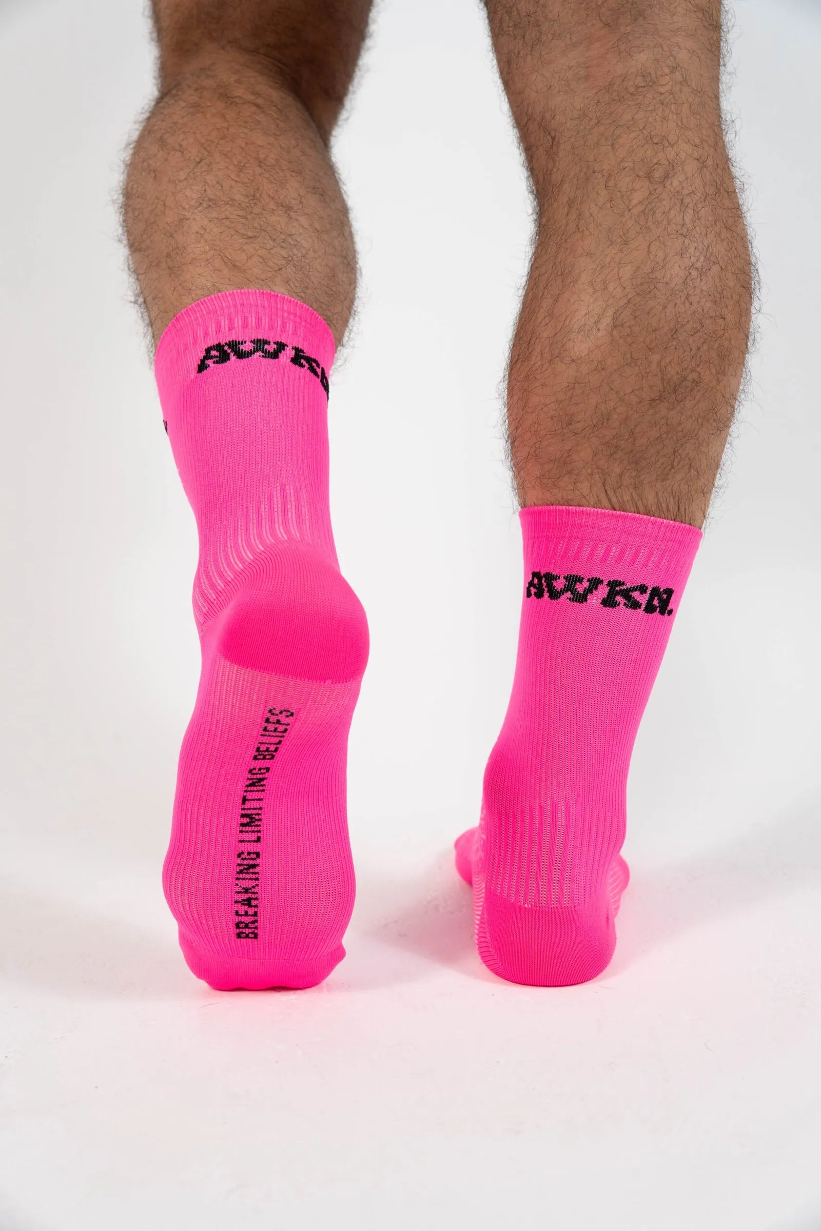 Calcetines para correr detalle logo color negro rosa flúor