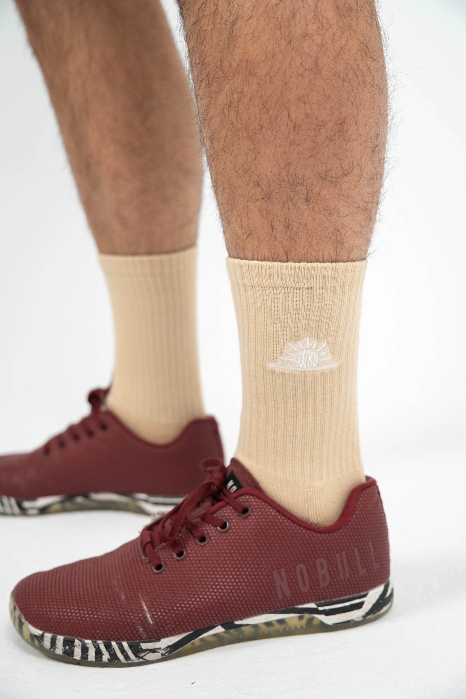 Calcetines tela perfil detalle logo color crema