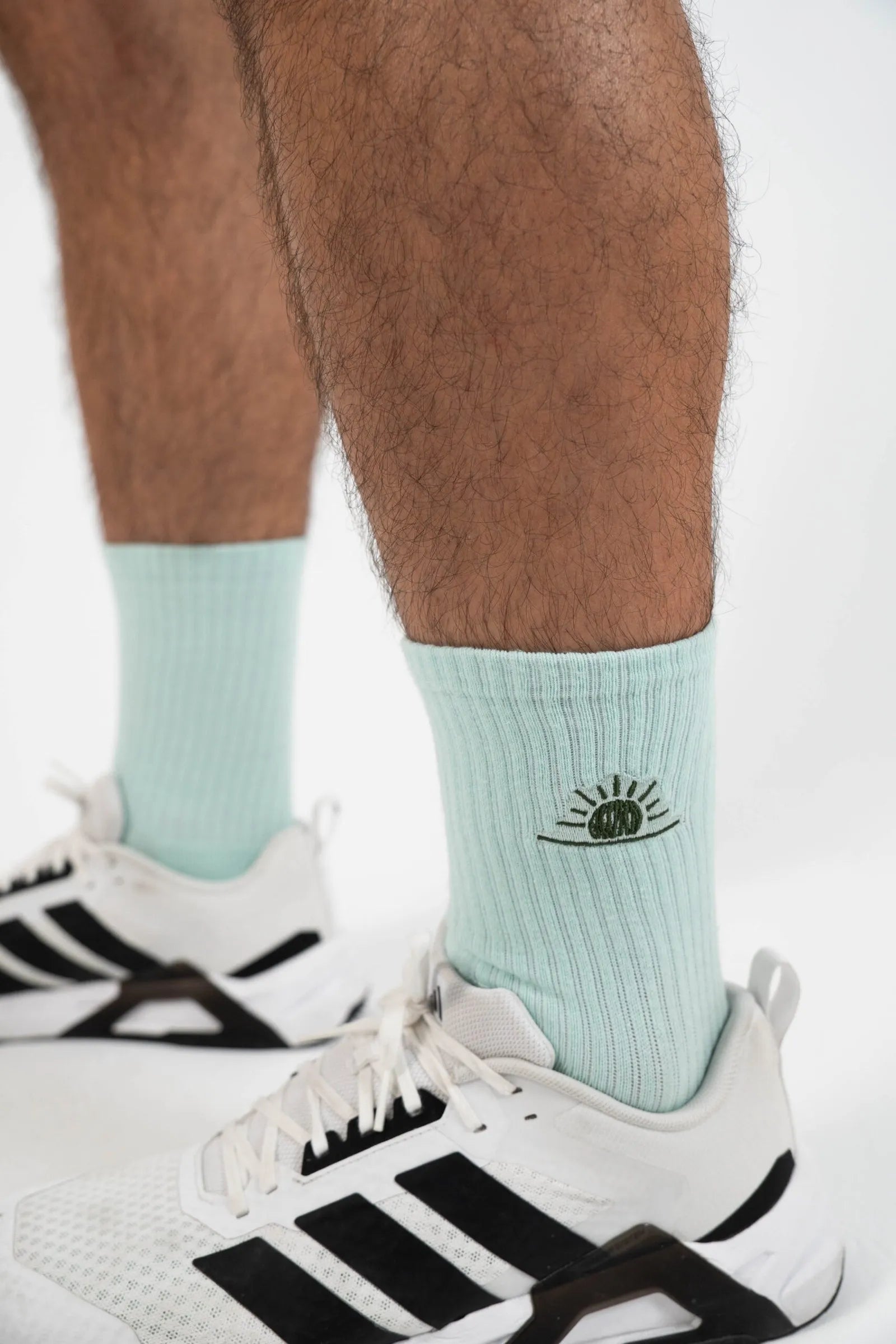 Calcetines tela perfil detalle logo color verde menta
