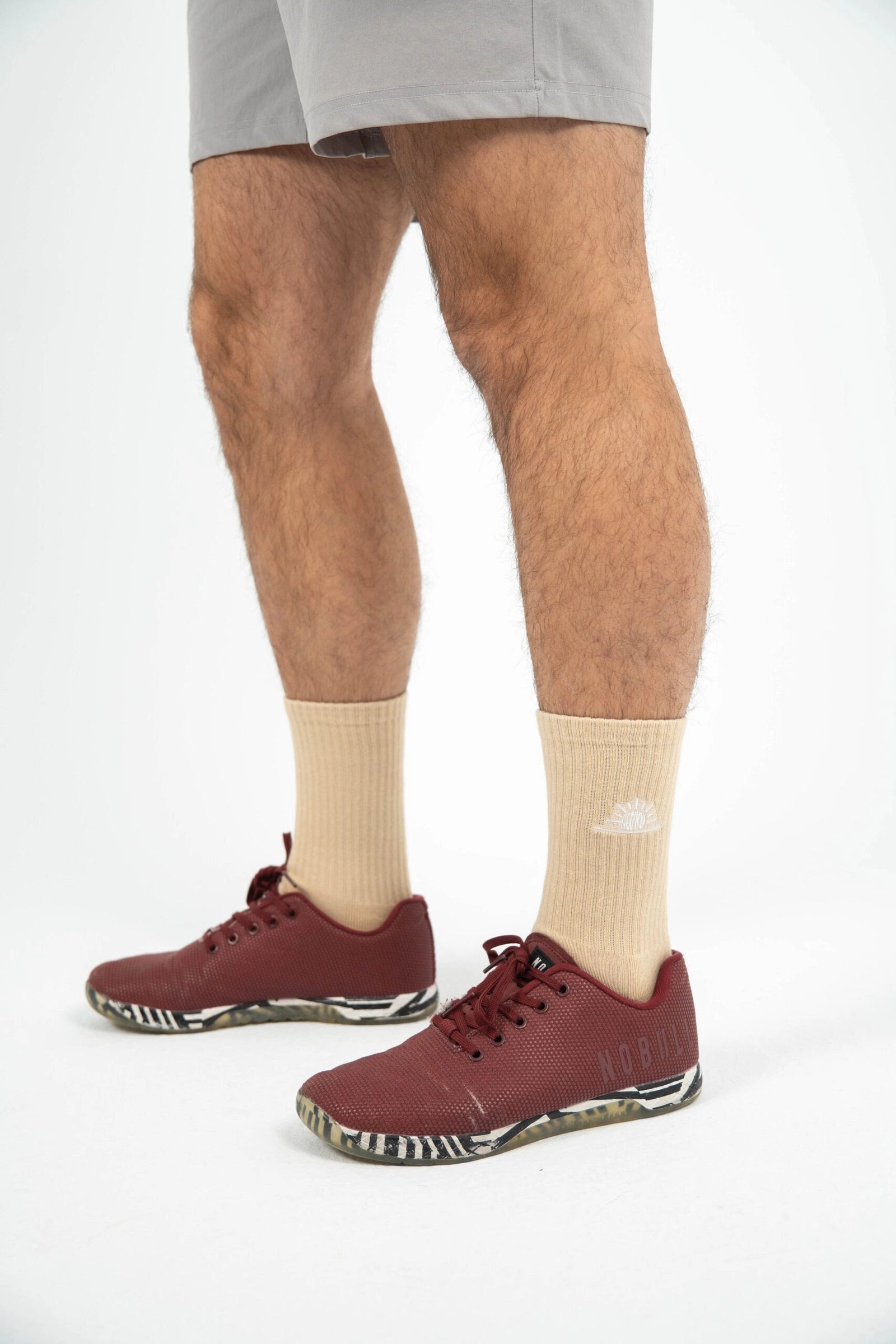 Calcetines tela perfil logo color crema