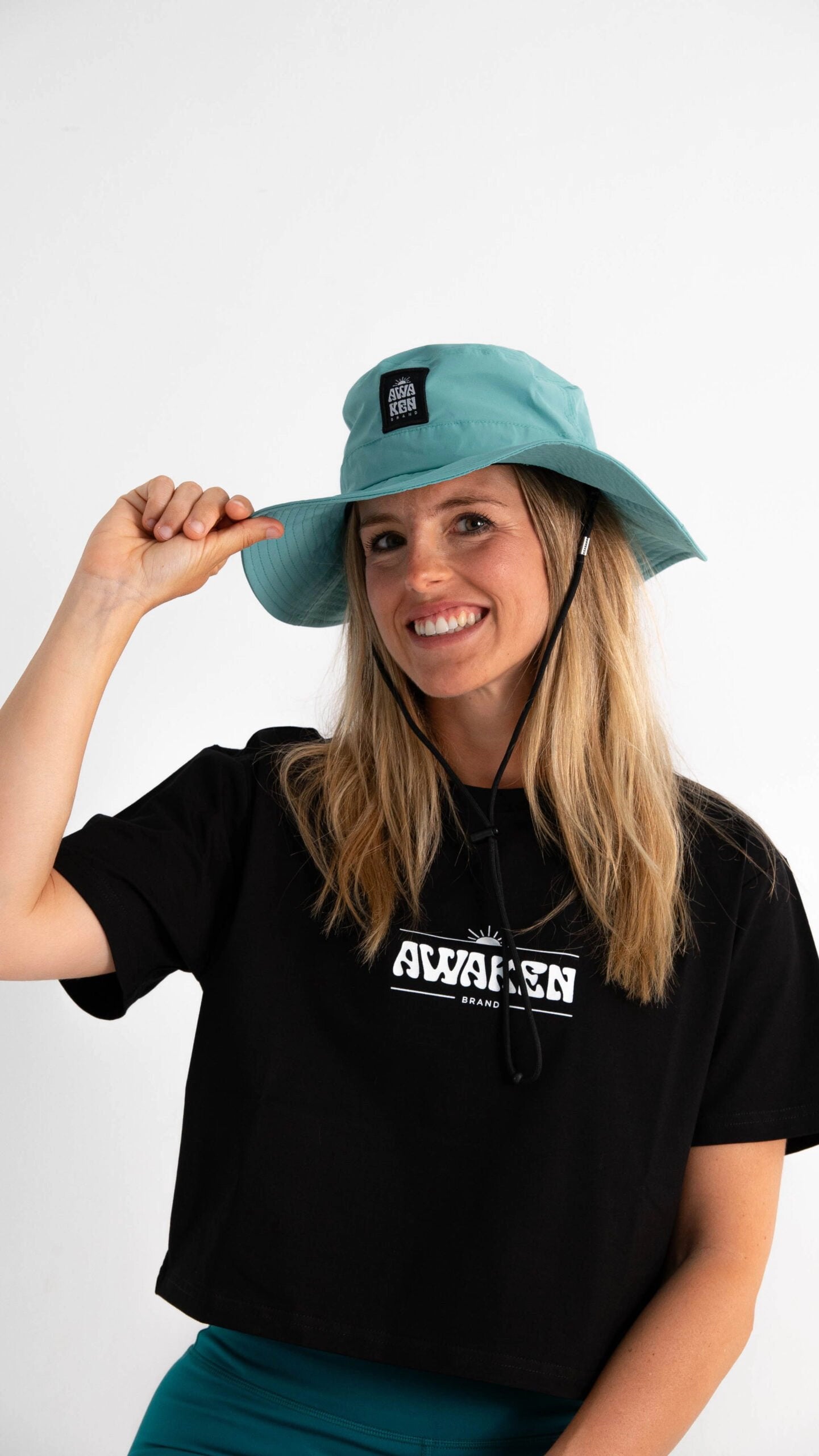 Gorro impermeable con cuerda frontal logo color azul cyan