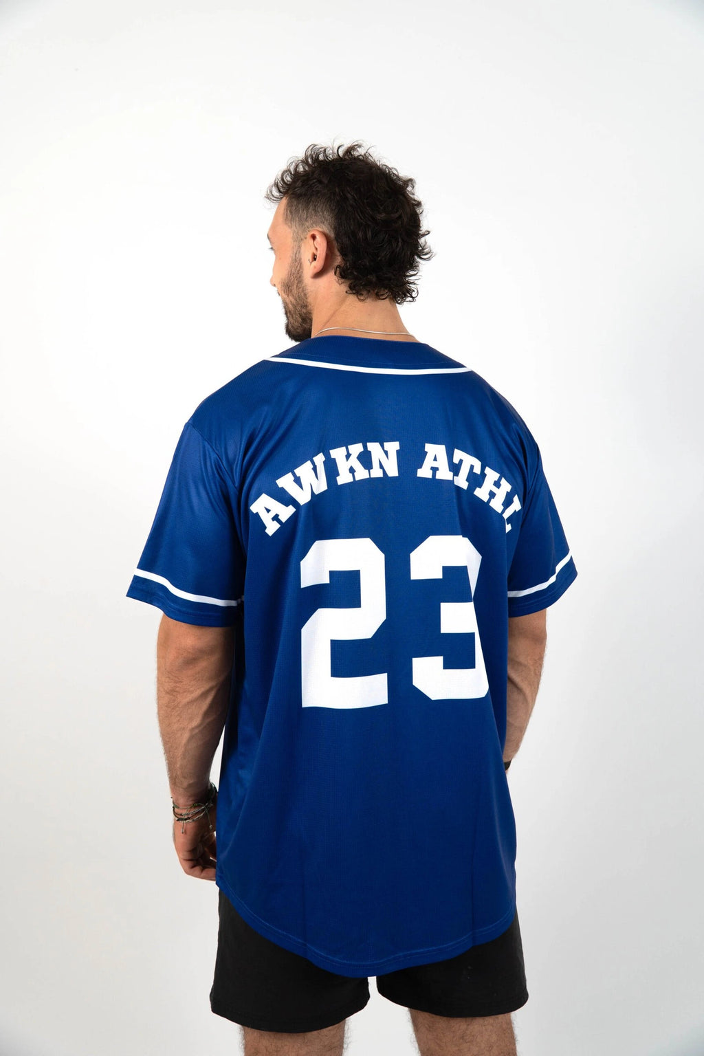 Camiseta beisbol unisex trasera logo color azul marino