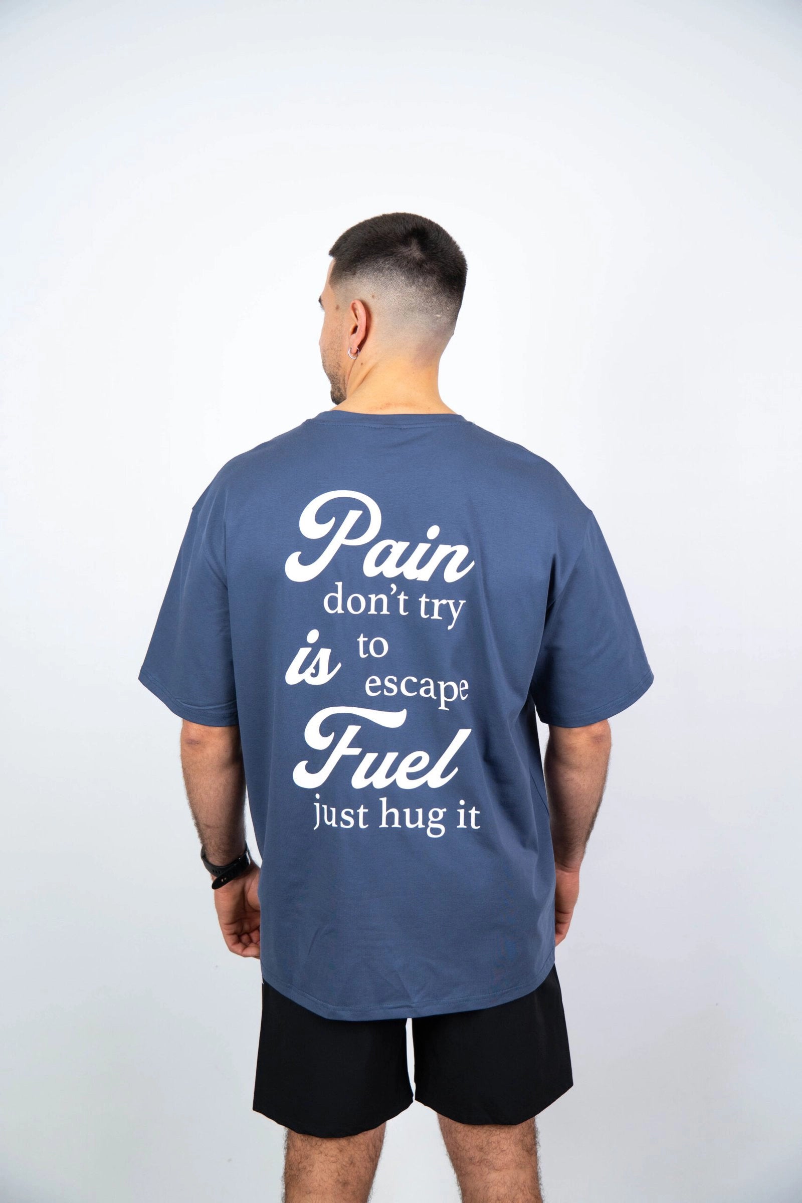 Camiseta de manga corta hombre oversize trasera color azul acero