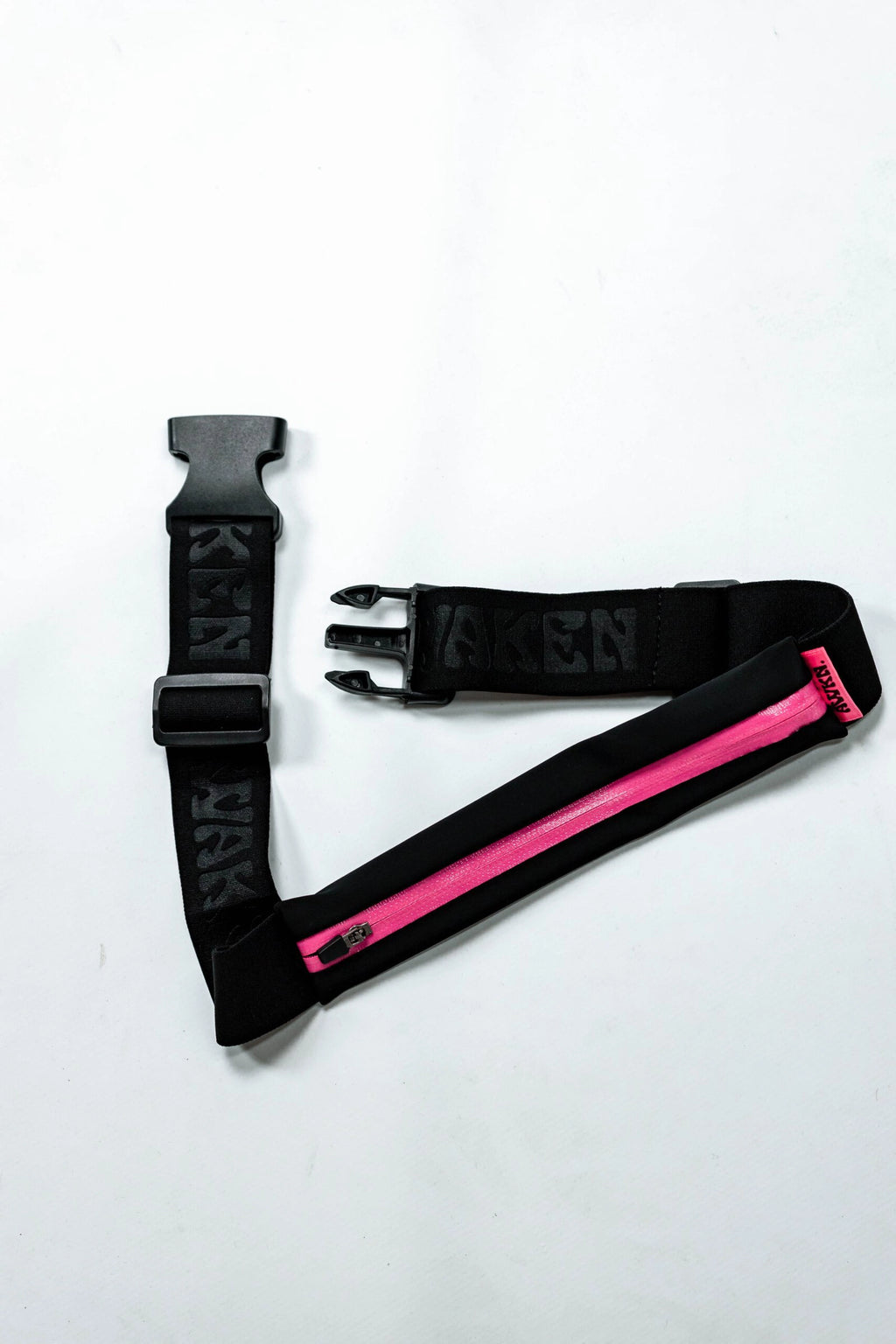 Cinturon carrera con banda ajustable negro y rosa