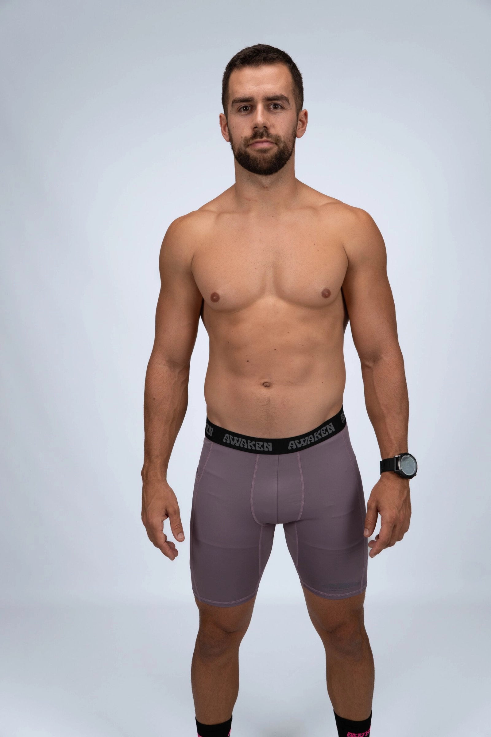 malla compresiva hombre frontal logo color lila arándano