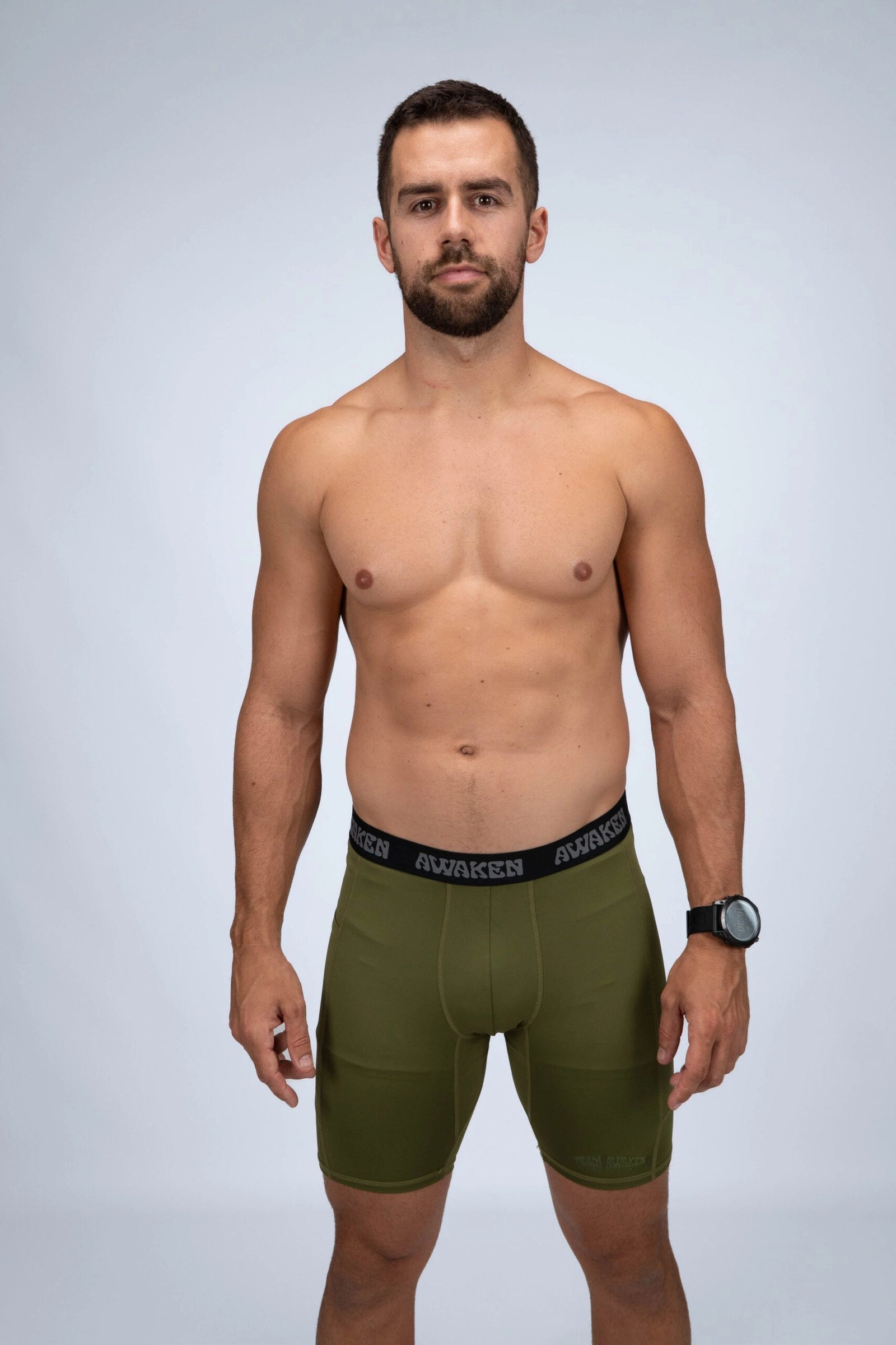 malla compresiva hombre frontal logo color verde matcha