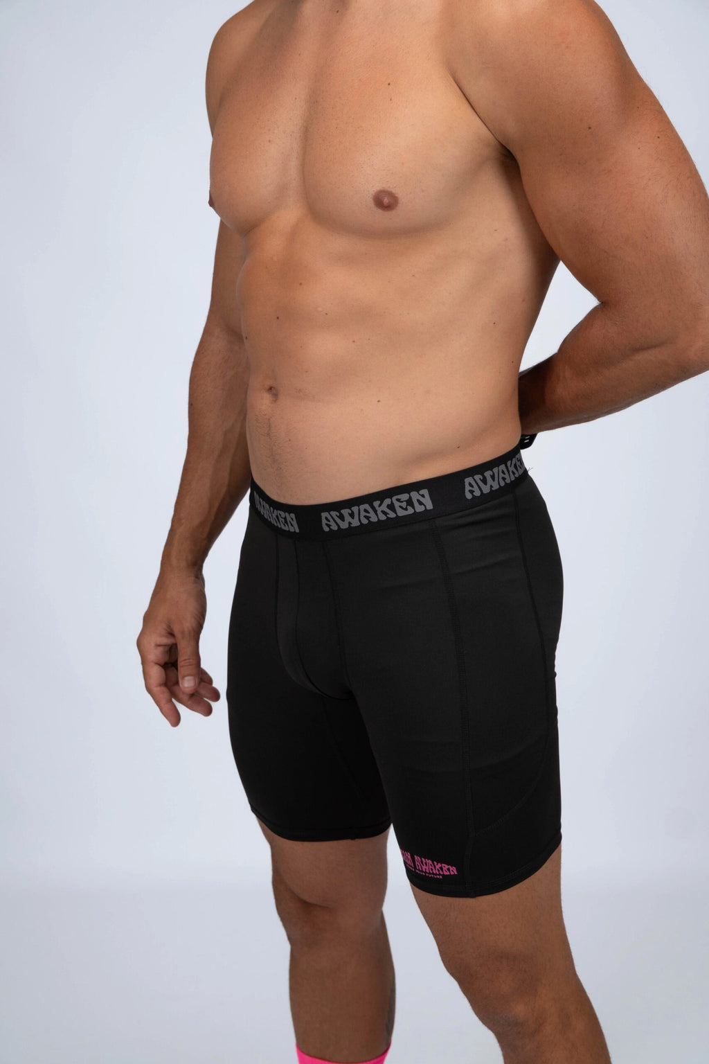 malla compresiva hombre perfil detalle logo color negro
