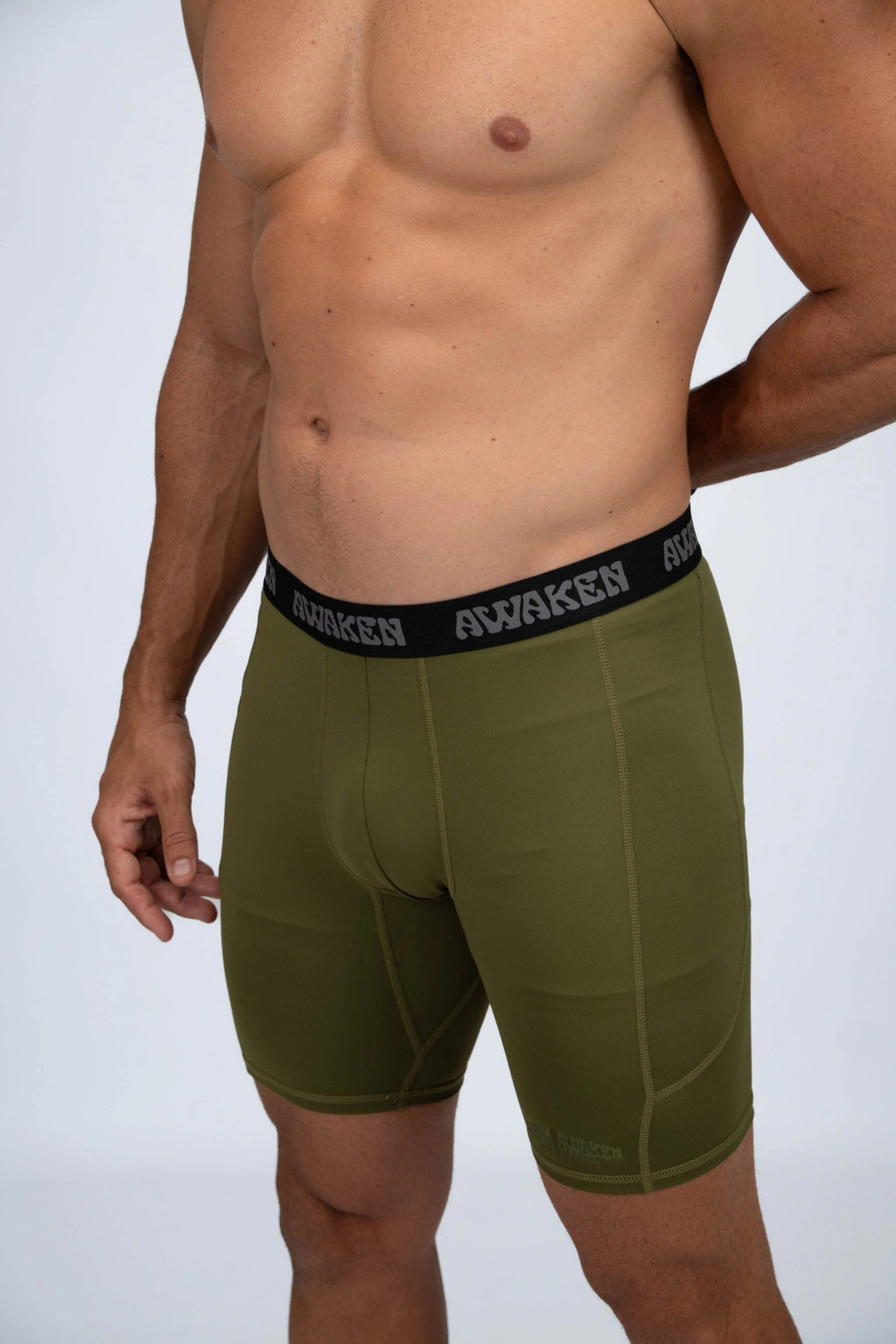 malla compresiva hombre perfil detalle logo color verde matcha