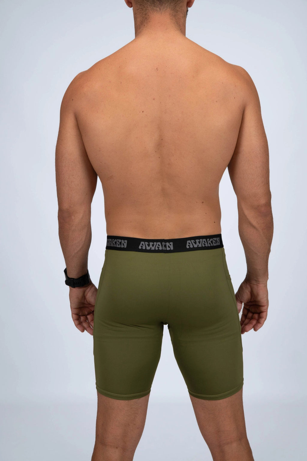 malla compresiva hombre trasera logo color verde matcha
