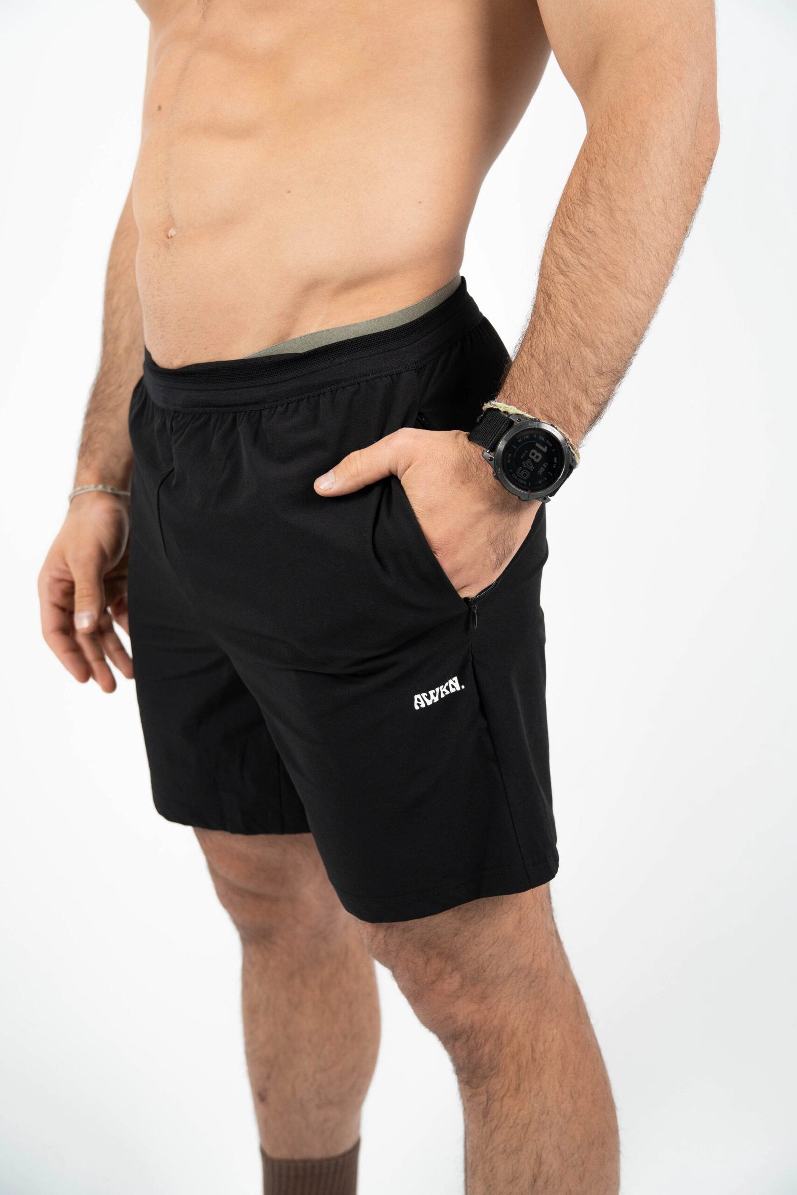 Pantalón corto hombre perfil detalle logo color negro